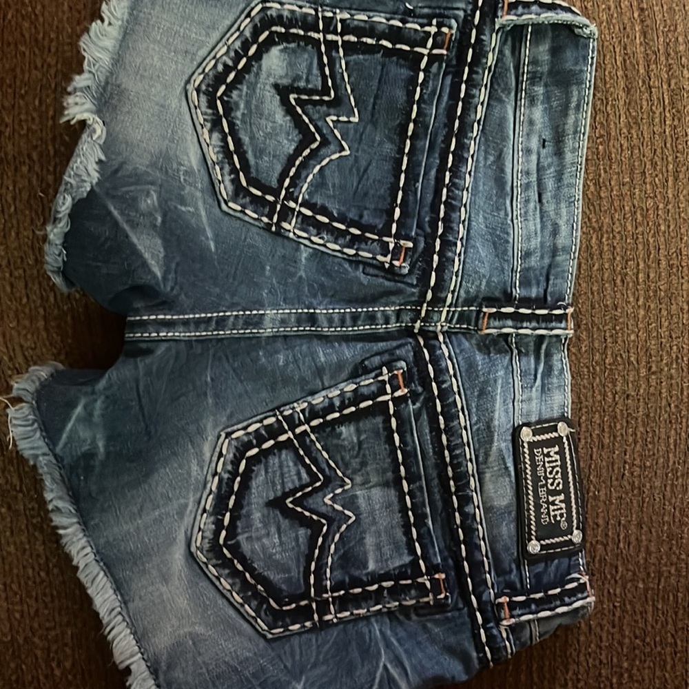 MISS ME DENIM BRAND w/ A fringe end. Condition excellent!